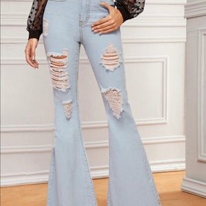 Ripped flare jeans